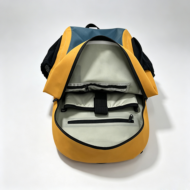Interior of the SL-E071 backpack showing padded laptop sleeve, retention strap and zipped pocket